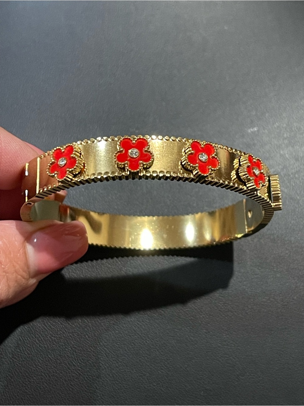 Gold tone stainless steel Bangle Bracelet with Red Flower Accents